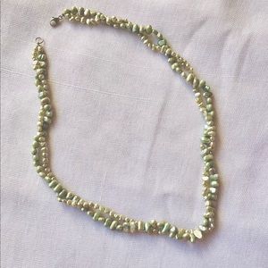 Double strand fresh water pearl necklace. Seed pearls in light blue and white.